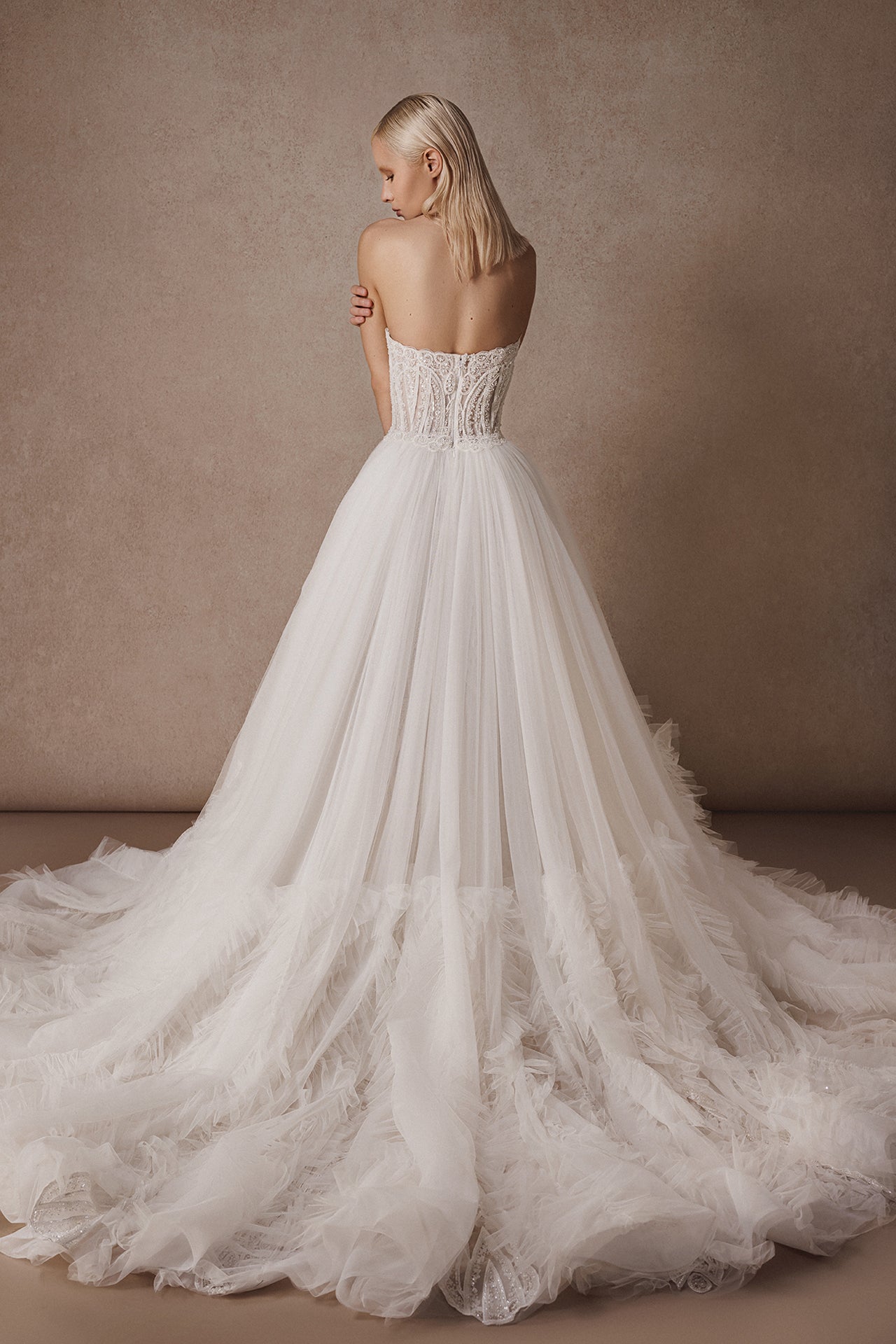 Strapless Column Gown with Sequins, Crystal Stones and Overskirt