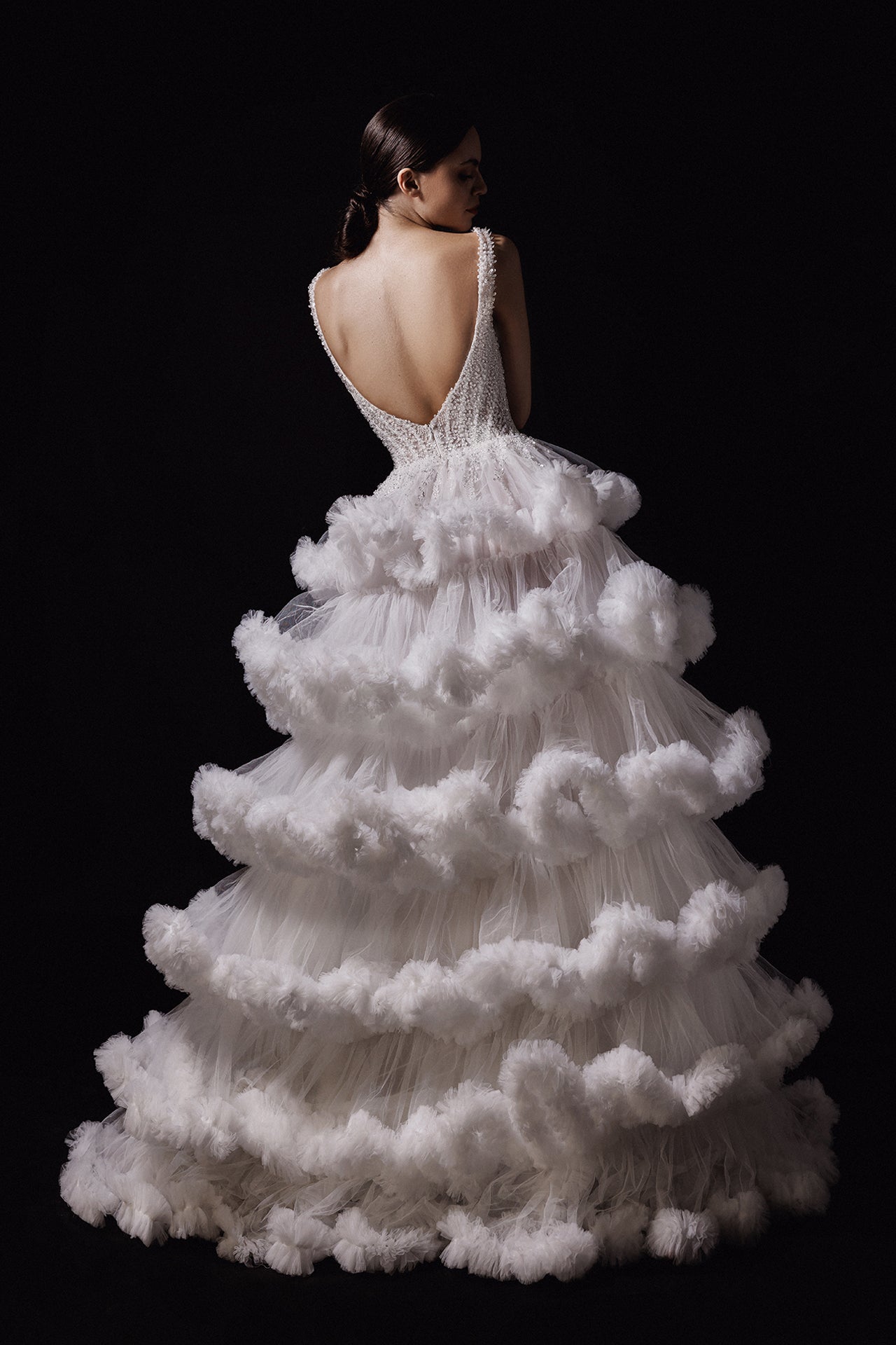 Sleeveless Wedding Gown with Embroidered Bodice and Ruffled A-Line Skirt