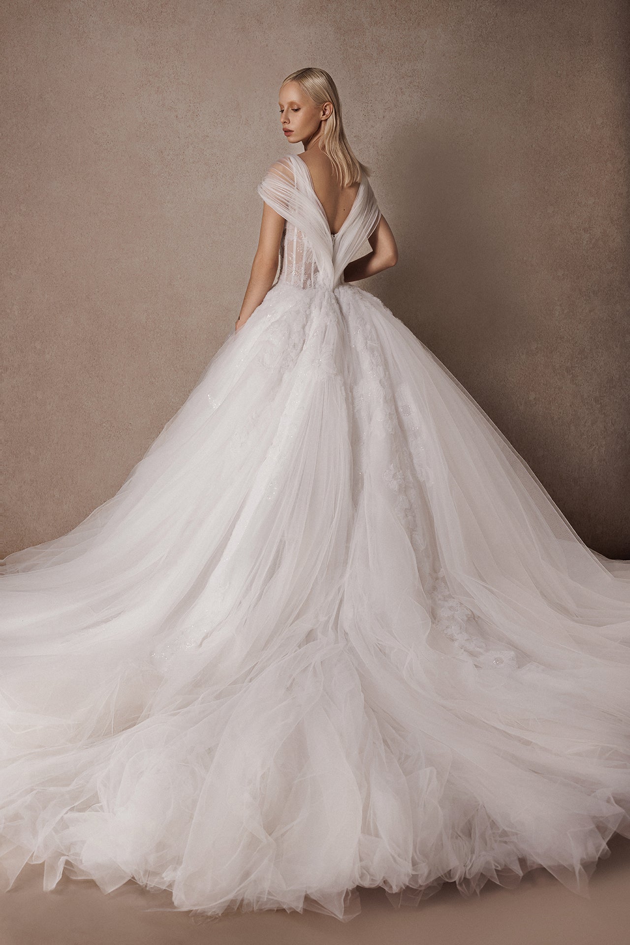 Sleeveless Princess Wedding Gown with Embroidered Bodice and Pleated Draped Shoulders