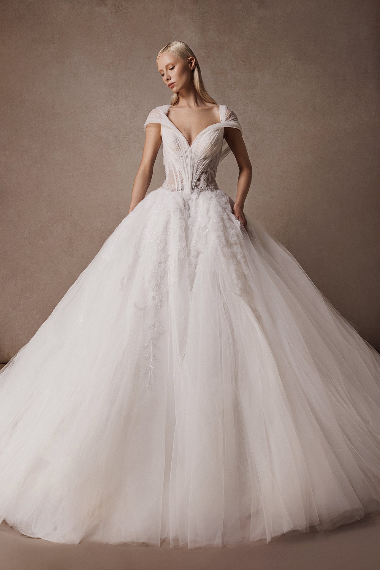 Sleeveless Princess Wedding Gown with Embroidered Bodice and Pleated Draped Shoulders