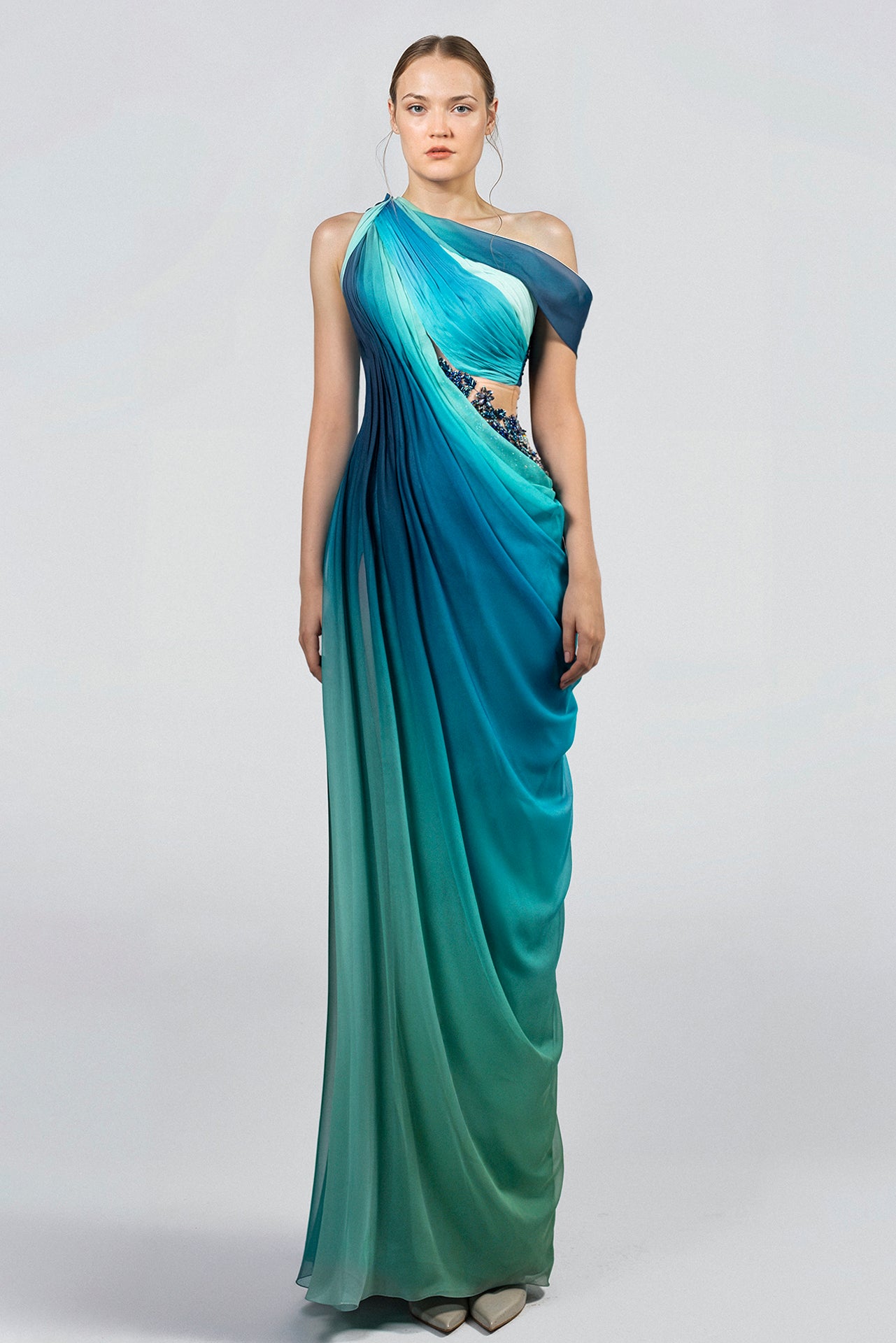 Load and play video in Gallery viewer, Blue and green ombre dress, one-shoulder design, floor-length chiffon, draped silhouette, embroidered waist detail, open back.