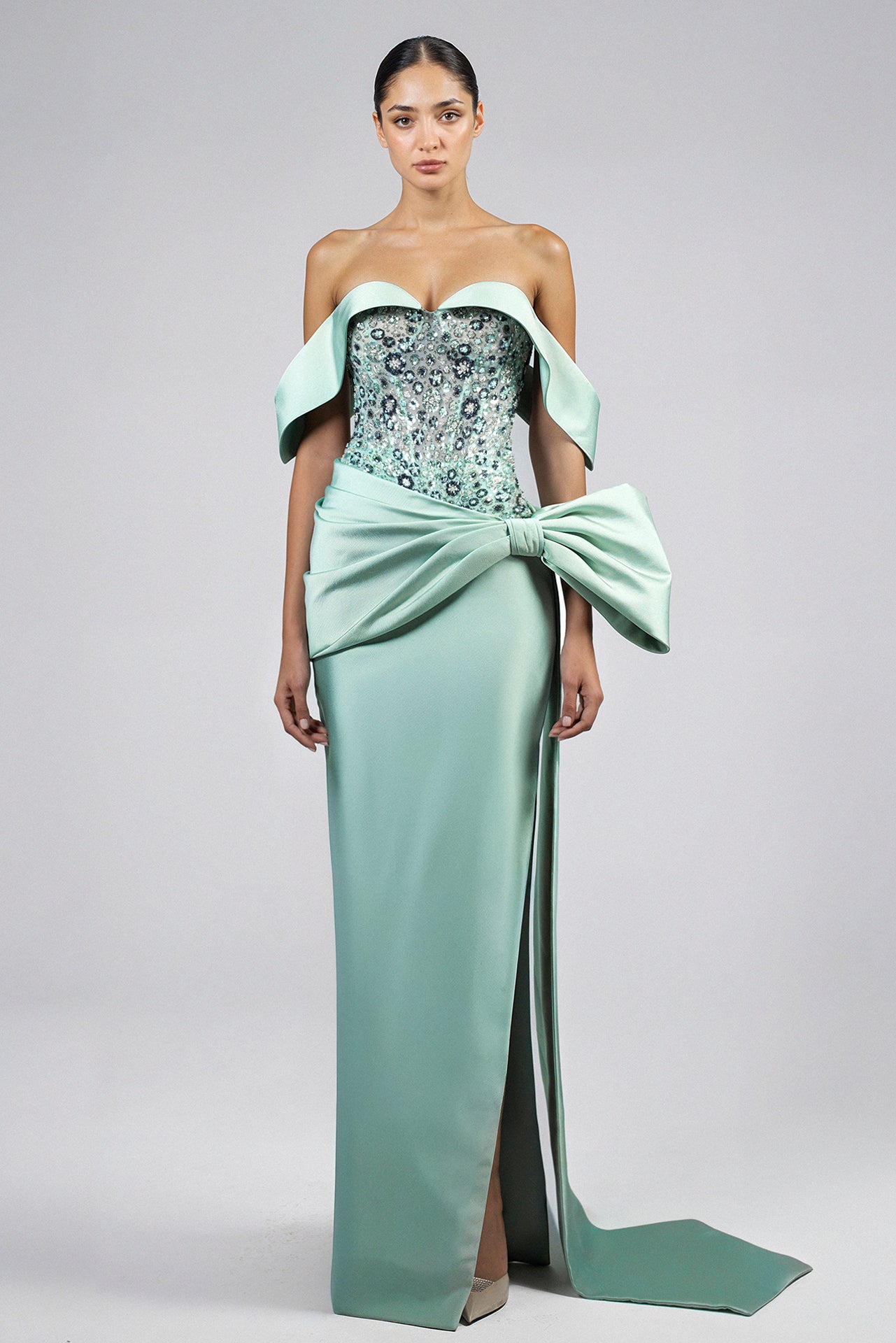 Load and play video in Gallery viewer, Mint green dress, off-shoulder neckline, embroidered tulle bodice, Mikado skirt, front slit, side bow, back zipper, train.