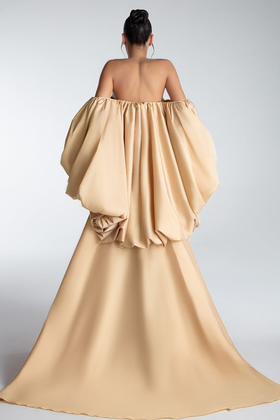 Strapless Gown With Draped Bodice And Sculptural Cape