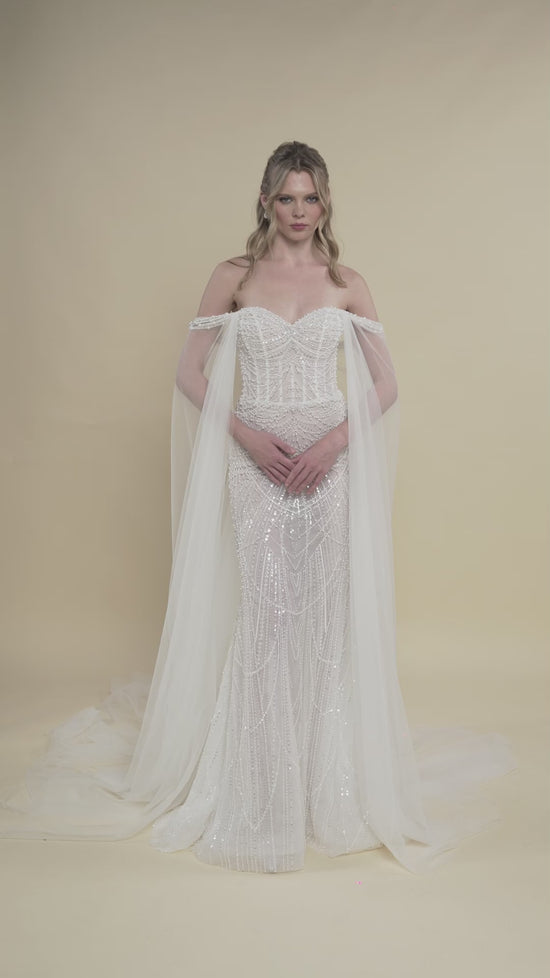 Load and play video in Gallery viewer, Off-Shoulder Mermaid Bridal Gown with Beaded Geometric Embellishments
