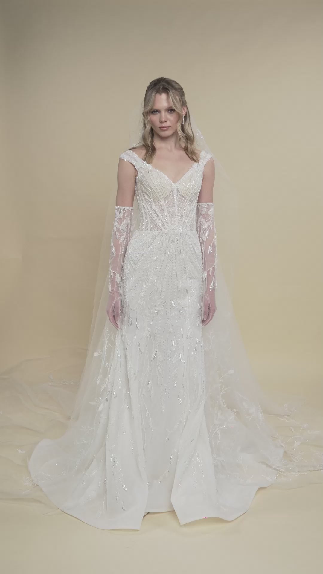 Load and play video in Gallery viewer, Plunging V-Neck Mermaid Bridal Gown with Beaded Mesh Sleeves and Chapel Train
