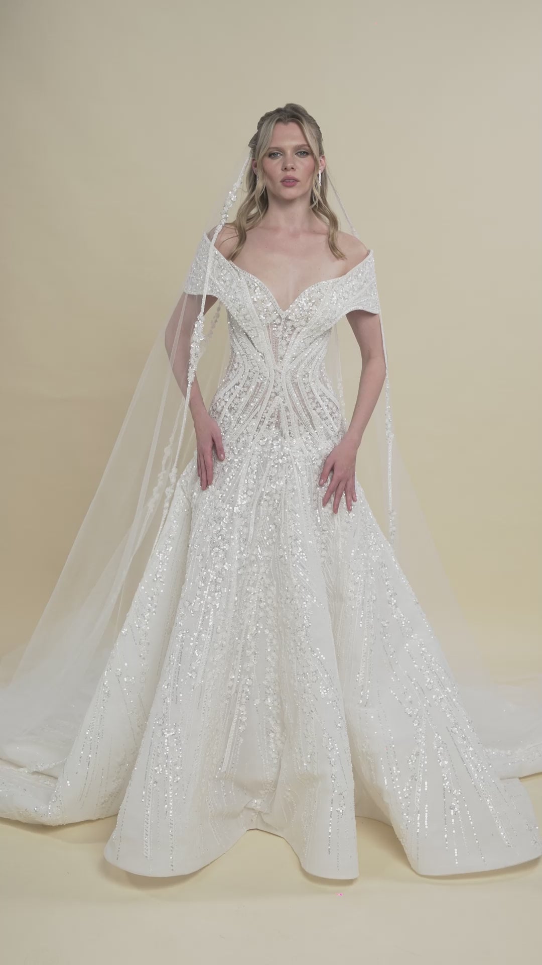 Load and play video in Gallery viewer, V-Neck Off-Shoulder Bridal Gown with Geometric Beading and Chapel Train
