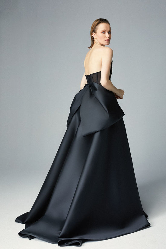 Strapless Black Net Evening Dress With Gold Dust embroidery, a Black Cady Bow & Over-skirt