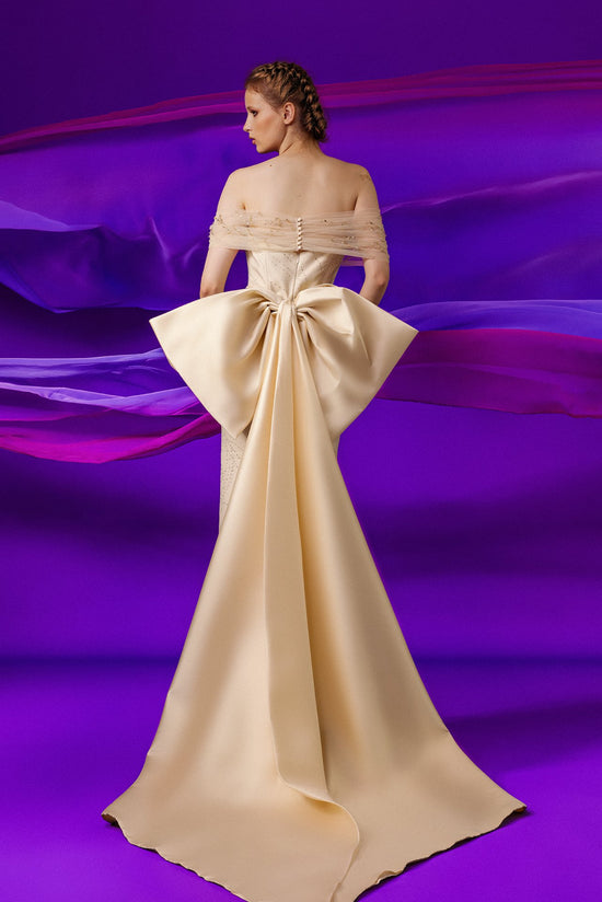 Plunging neckline back bow sweep train gown