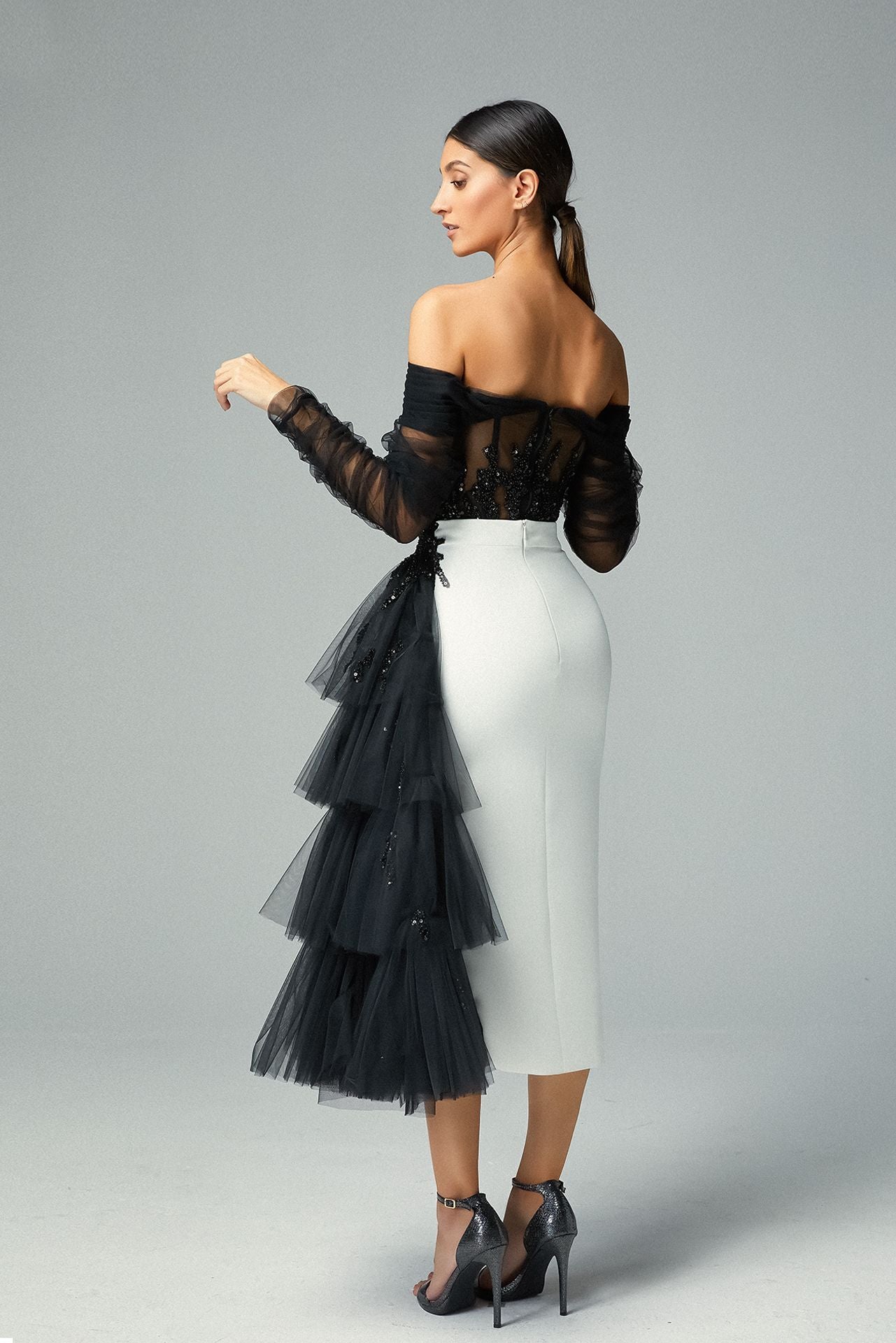 Off-shoulder Embroidered Floral Corset & white crepe and ruffled sequined black Column Midi Skirt