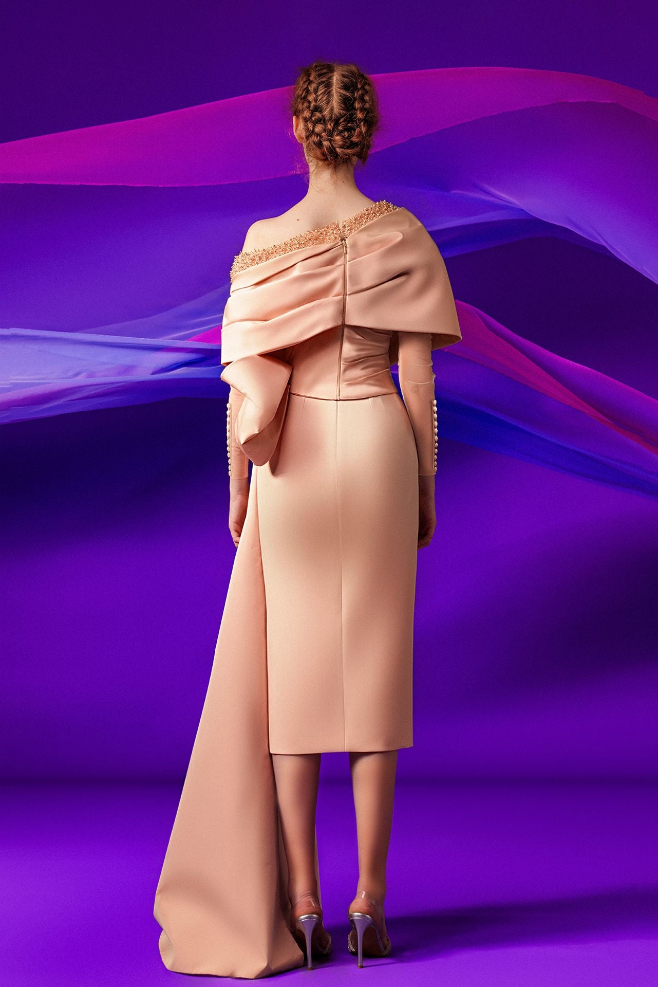 Asymmetric beaded top featuring midi skirt